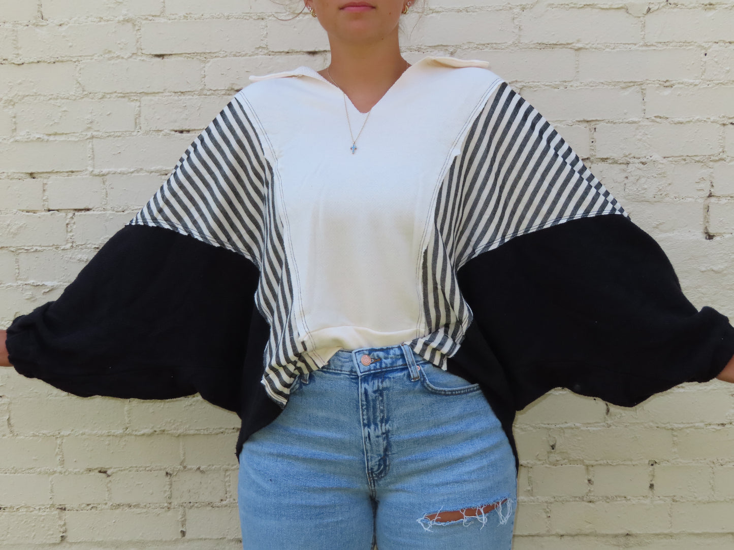 Oversized black collared v top